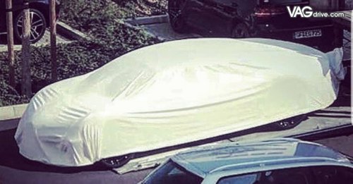 four-door-bugatti-sedan-spotted-hiding-under-cover-could-be-electric-128231_1.jpg